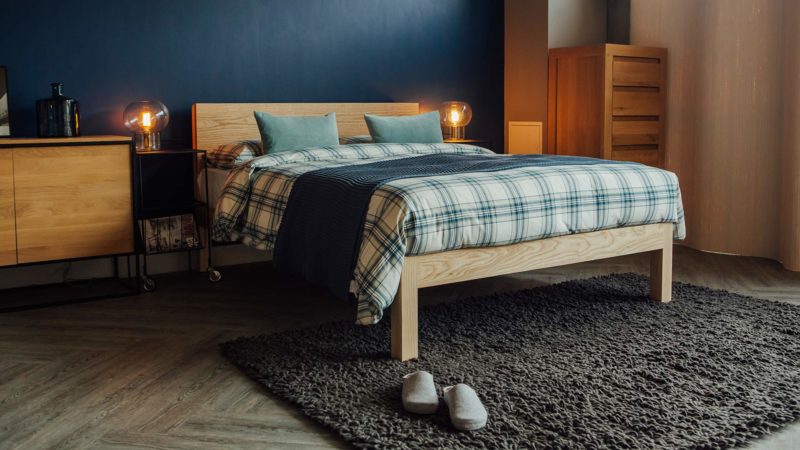 Ash Tibet bed with brushed cotton navy plaid bedding