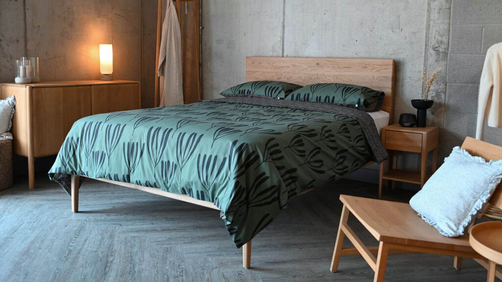Green and Black frond patterned bedding on English Oak Chiswick.