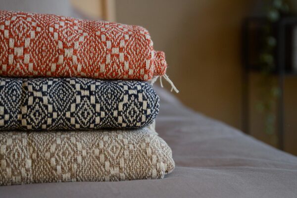 Diamond Pattern Fringed Throws Stack
