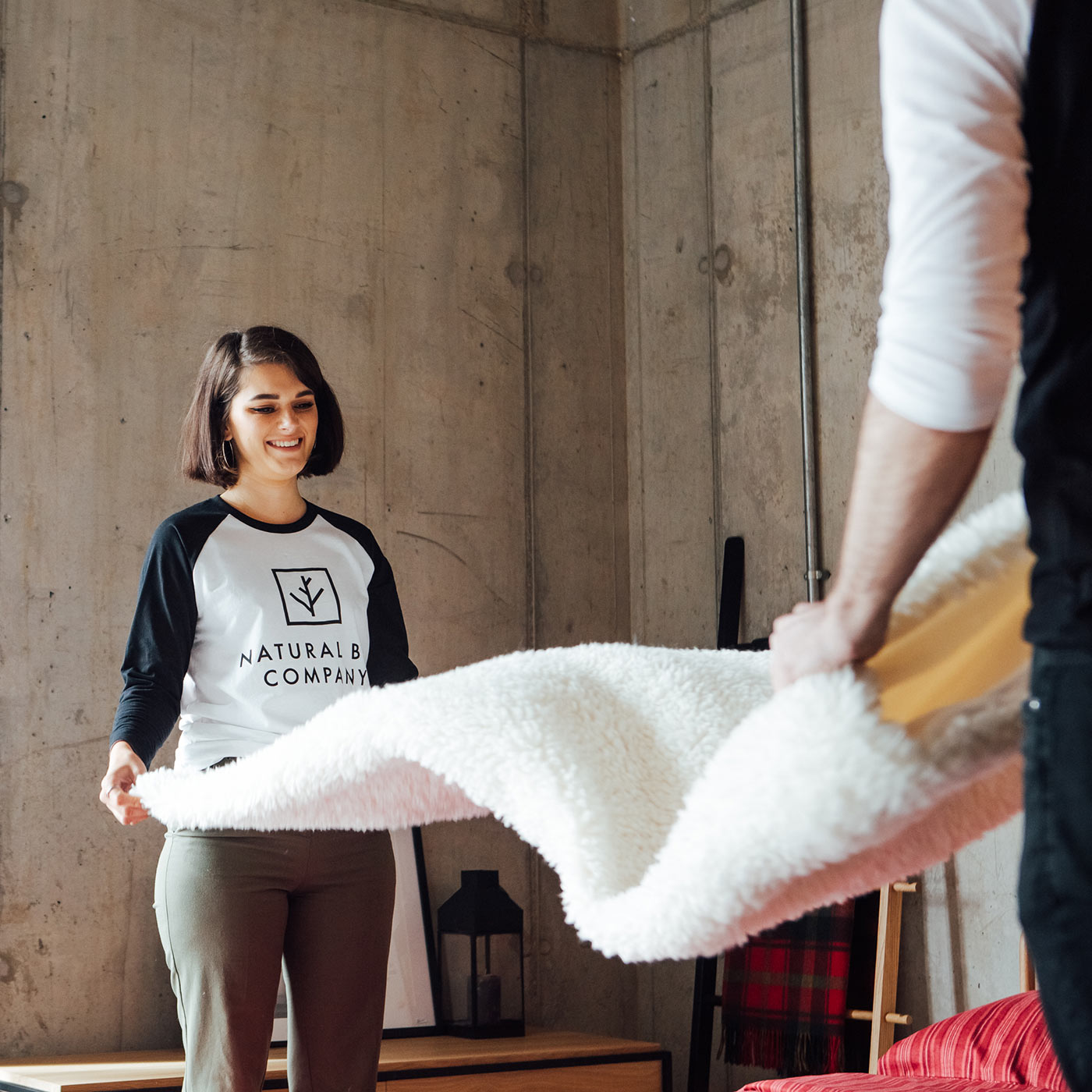 Matt Beth dressing a bed