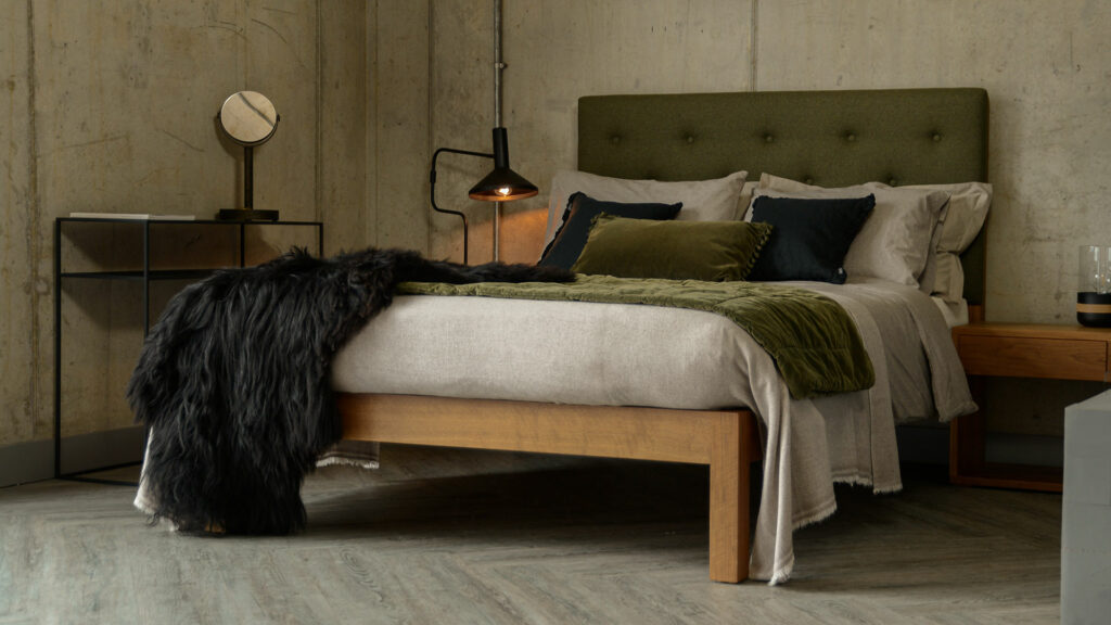 Skye bed with tall buttoned headboard in green