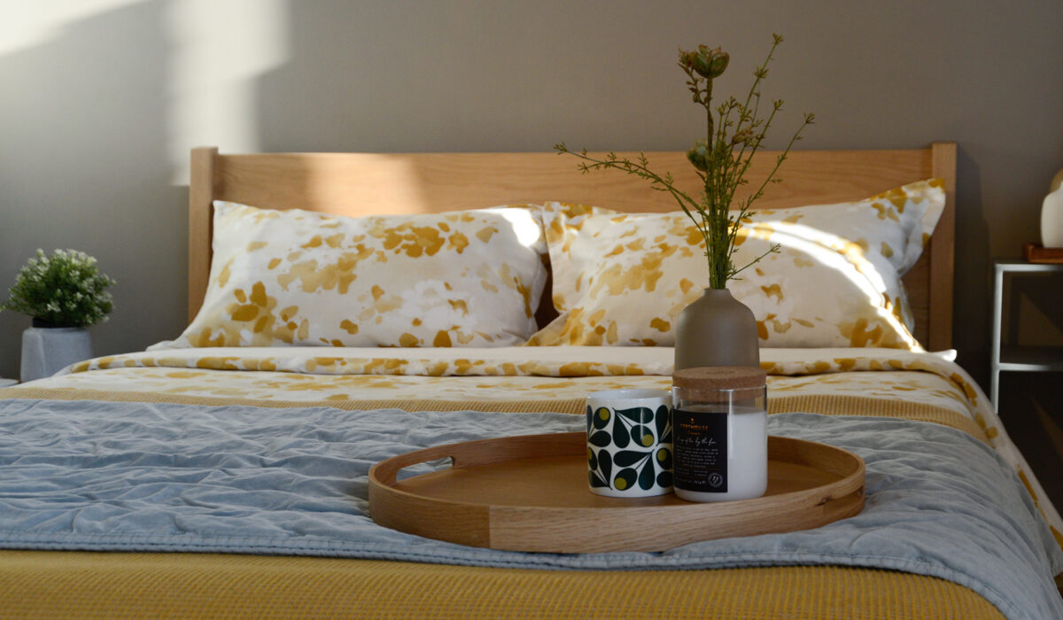 Springtime yellow bedding on Zanskar tray and vase
