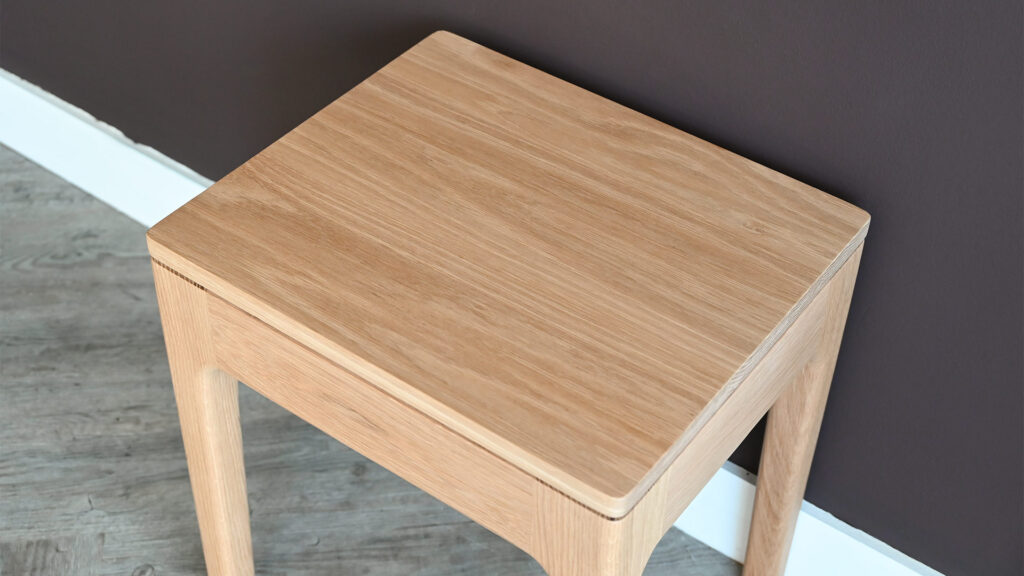 Close up of tall Camden table tabletop in oak.