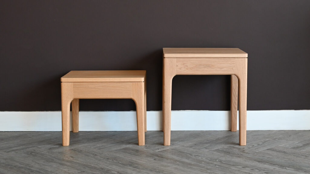 Two Oak Camden bedside tables, one all one original.
