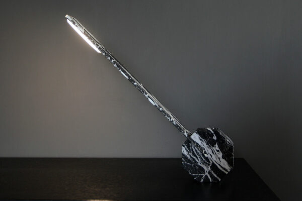 adjustable LED light on black marble