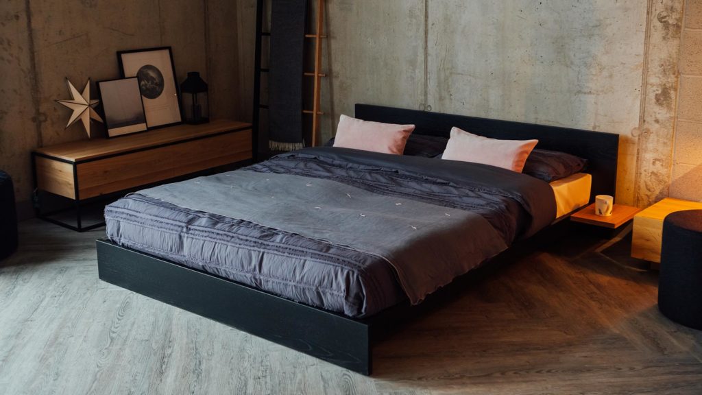 black oak Kulu bed with grey and pink bedding 3Q