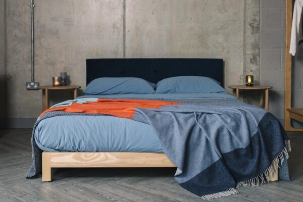 blue and orange cashmere throw with iona bed and stonewash bedding
