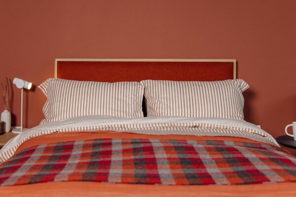 brick red bedding on the carlisle bed