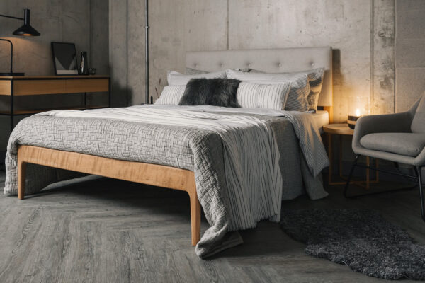 cherry bloomsbury bed with grey stripoed bedding
