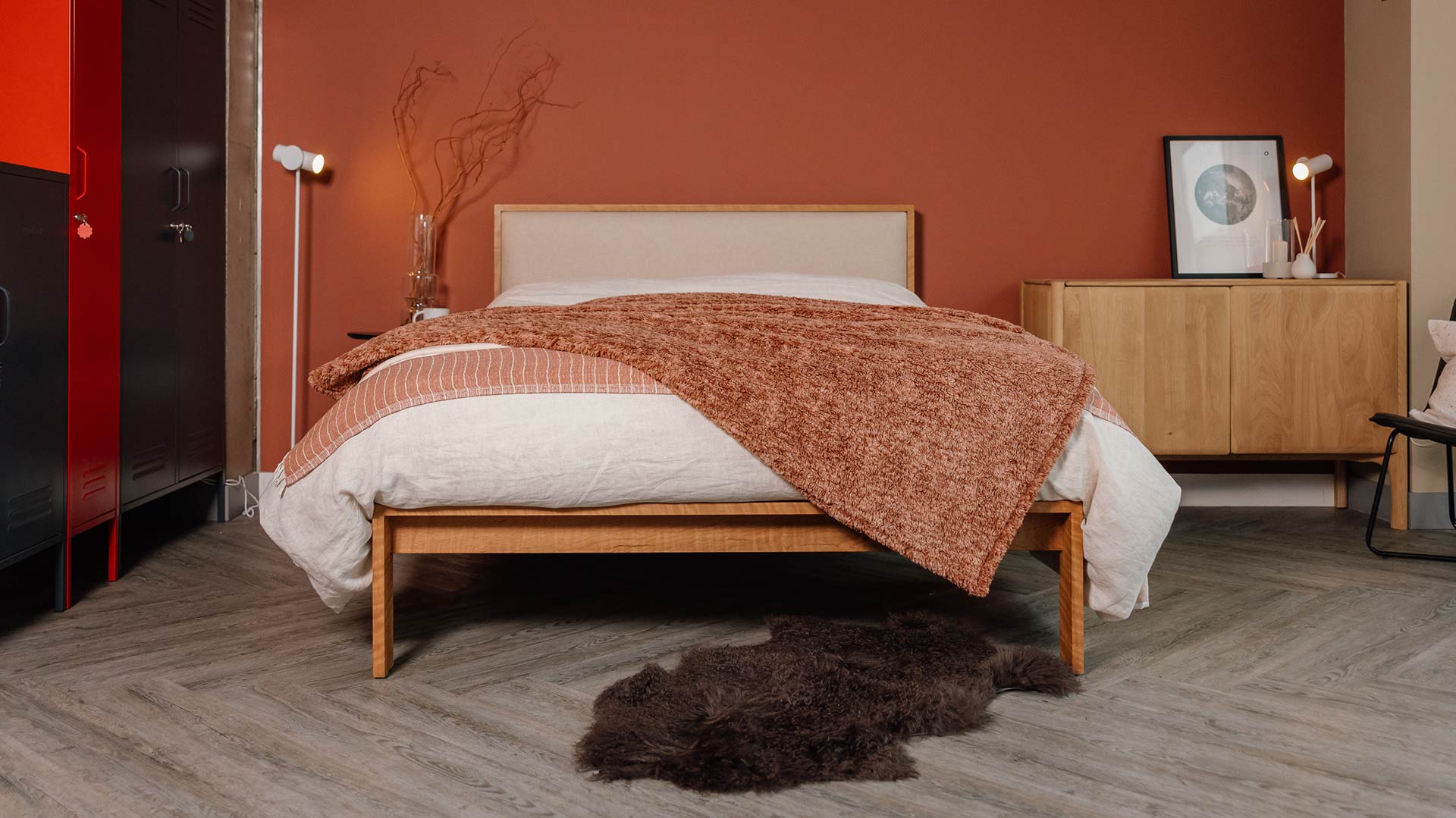 cherry wood Shetland bed with Amatheon headboard panel and longhair sheepskin throw brown