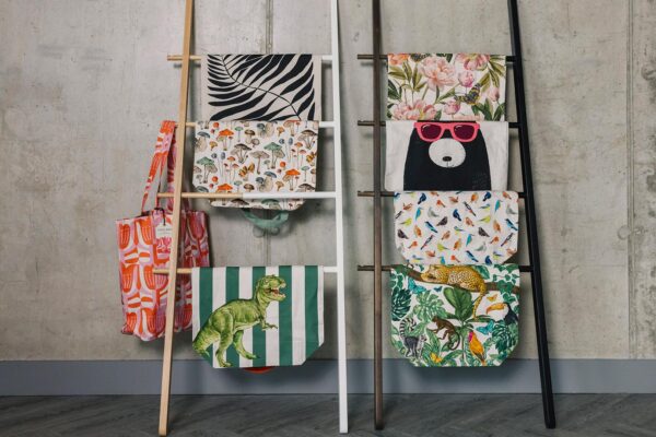collection of printed tote bags