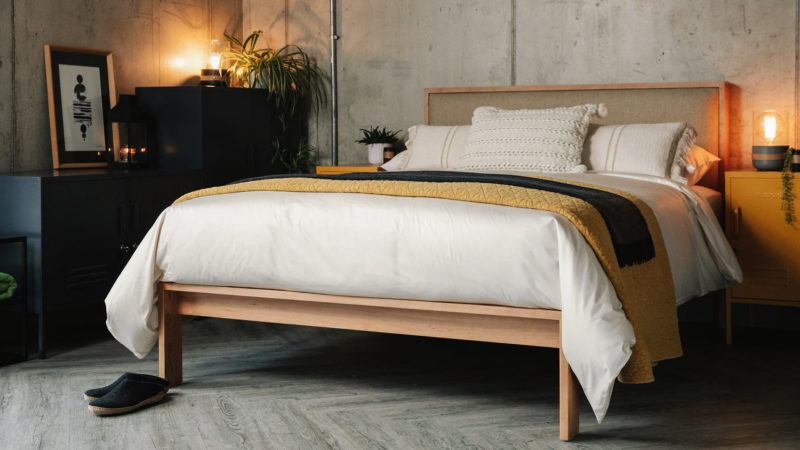 cosy bedroom with Strap lamps and mustard lockers