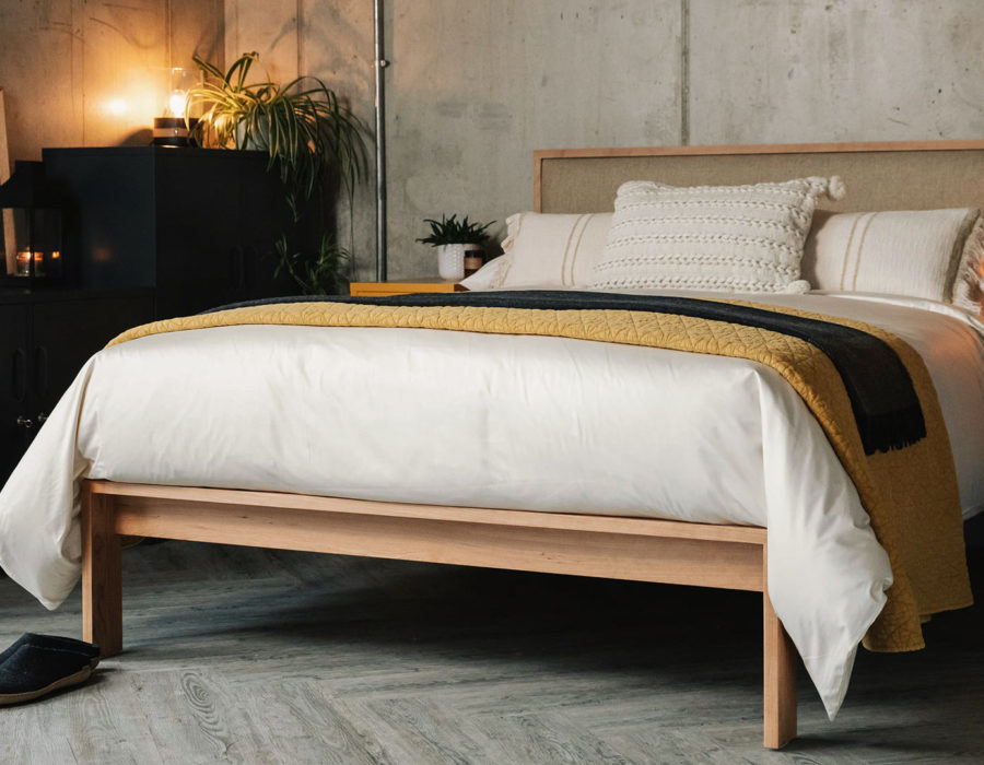 cosy bedroom with Strap lamps and mustard lockers