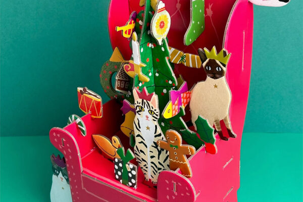 Festive advent calendar with pop and slot design. Christmas cats.
