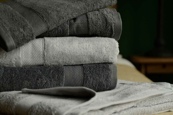 cotton terry towels in dark grey and light grey