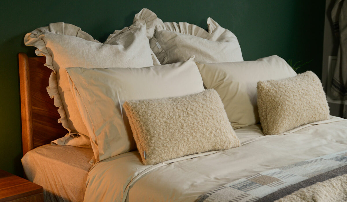 egyptian cotton with linen ruffle and faux sheep pillows