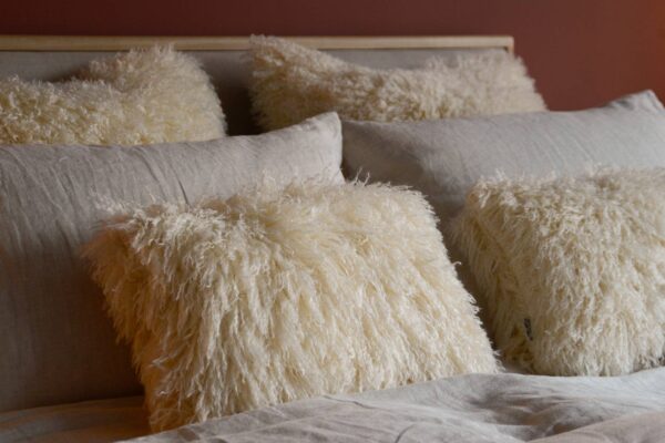 faux afghan cushions cream oblong