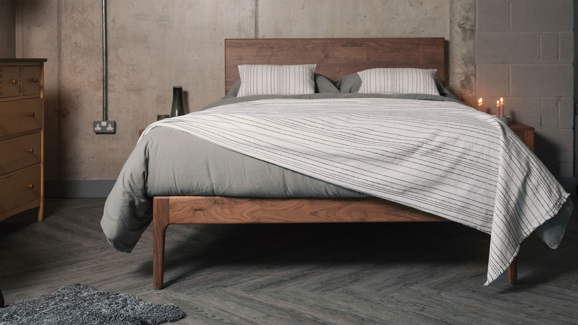 grey and white striped bedding on walnut Chiswick