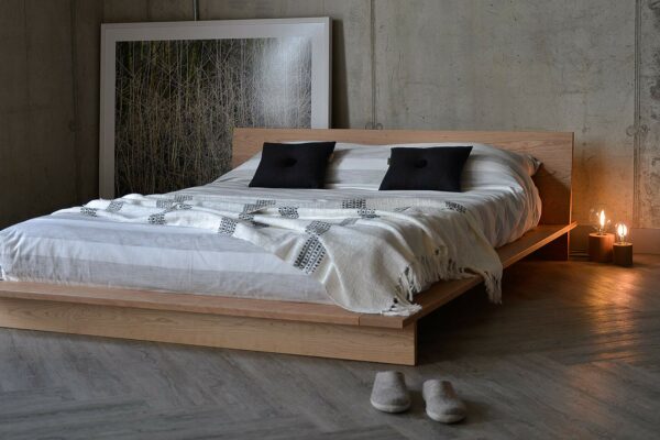 ivory and black bedding on Cherry wood bed Oregon