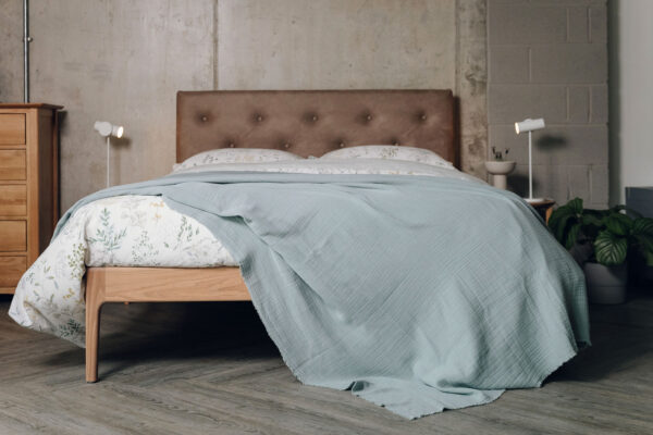 light bedspread in dusty aqua