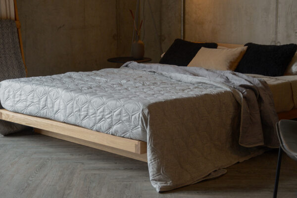 light grey hexagonal quilt