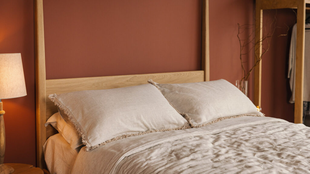 linen bedding in stone with fringe detail to pillowcase on oak Canterbury