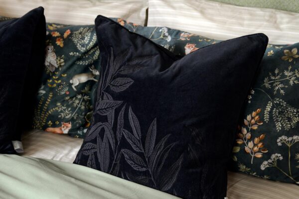 luxurious black velvet cushion with leaf embroidery