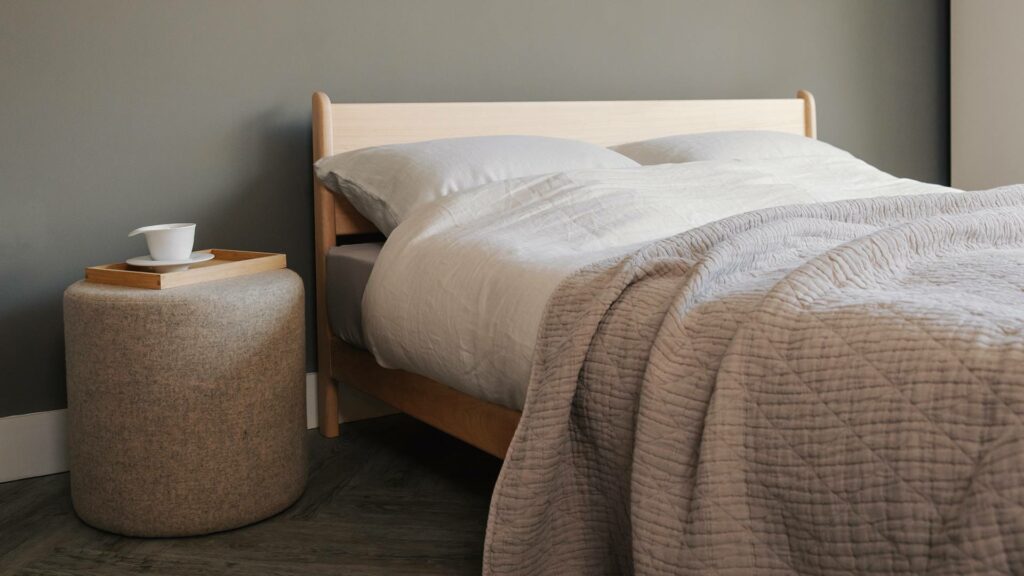 maple pimlico with wool covered stool and neutral bedding