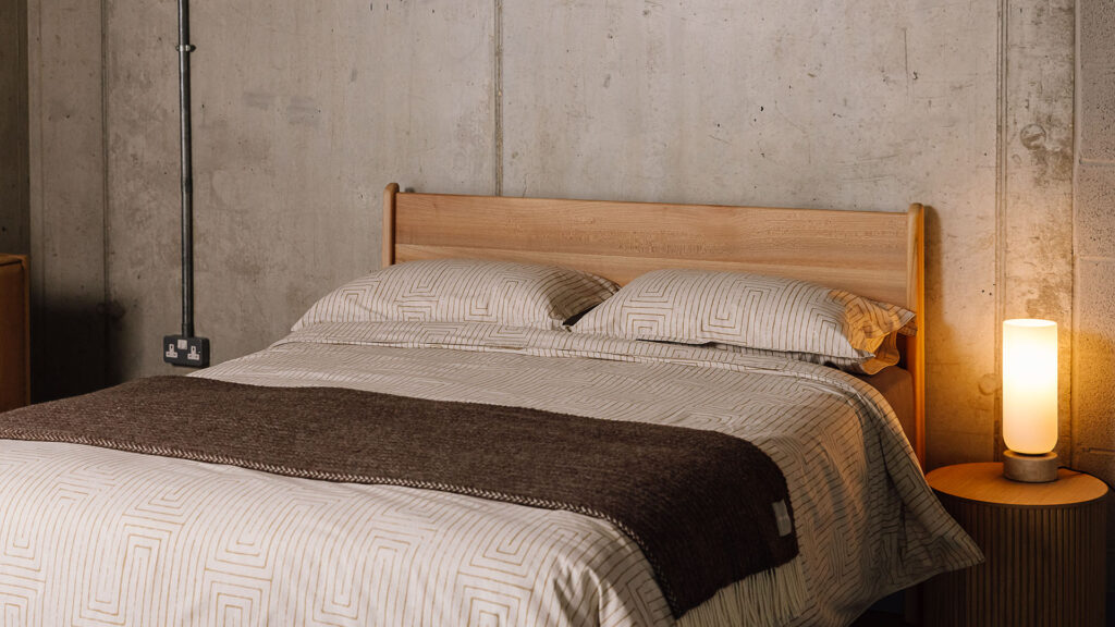 Gold grid pattern duvet set on Scottish Elm Camden bed.