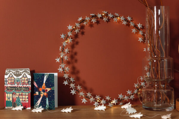 metal stars illuminated wreath with paper trees garland