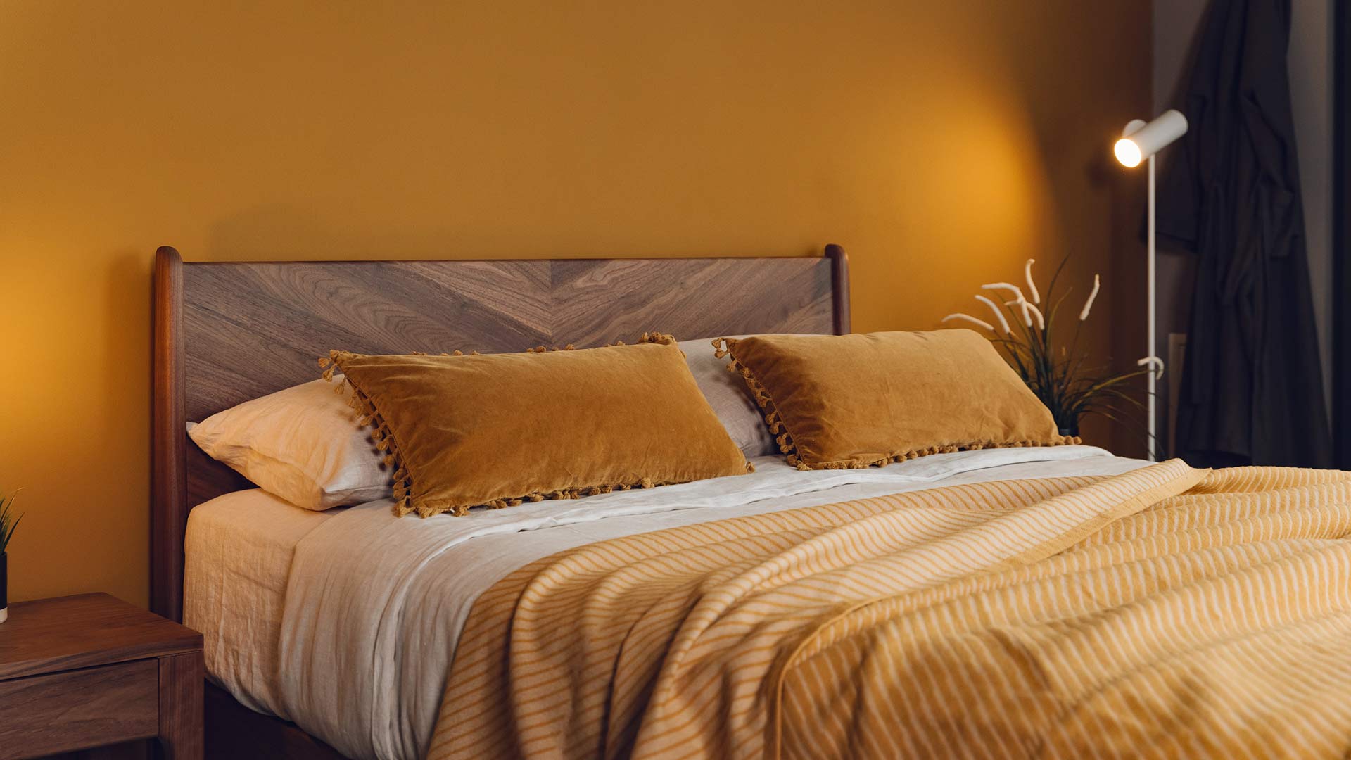 ochre accessories on walnut Hoxton bed