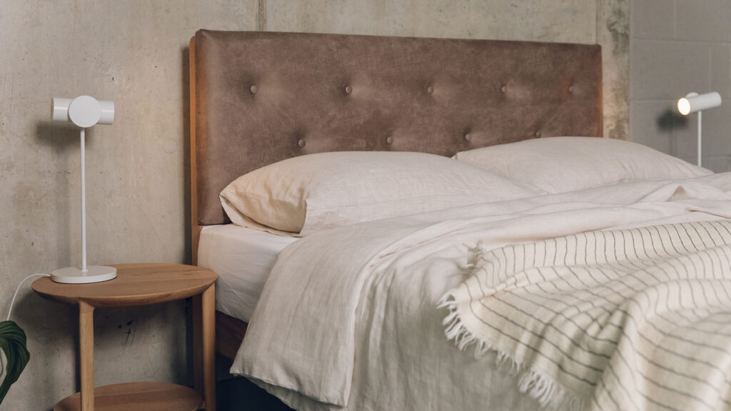 oiled oak and vaquero Bloomsbury bed with organic linen bedding