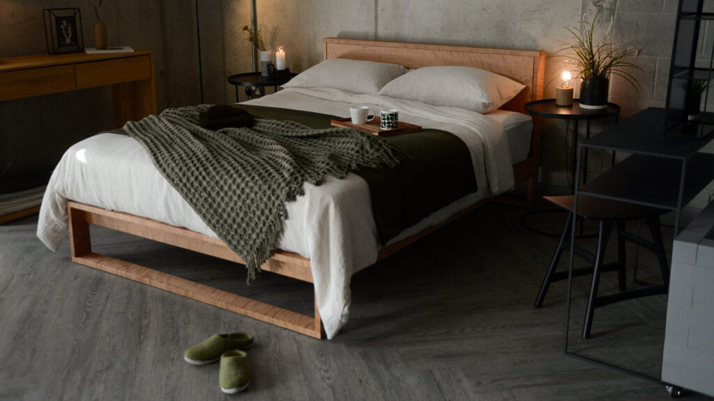 olive green throws on the Leith bed in cherry
