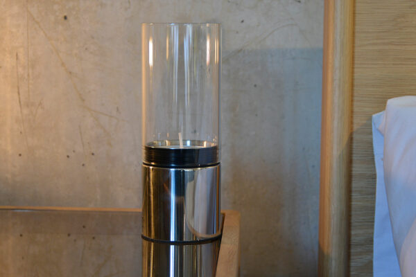 polished steel and glass candle holder