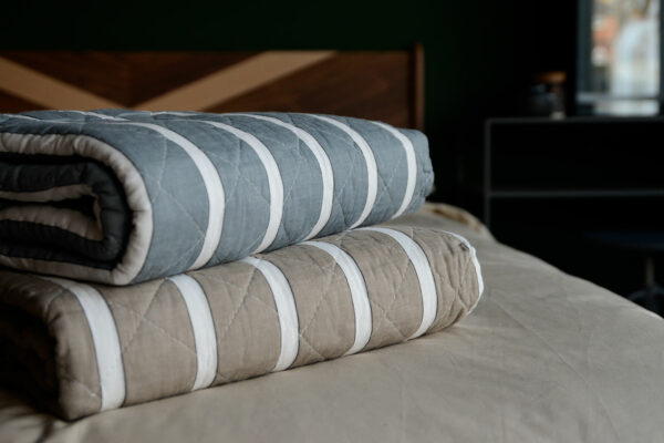 quilted throws with broad stripe pattern