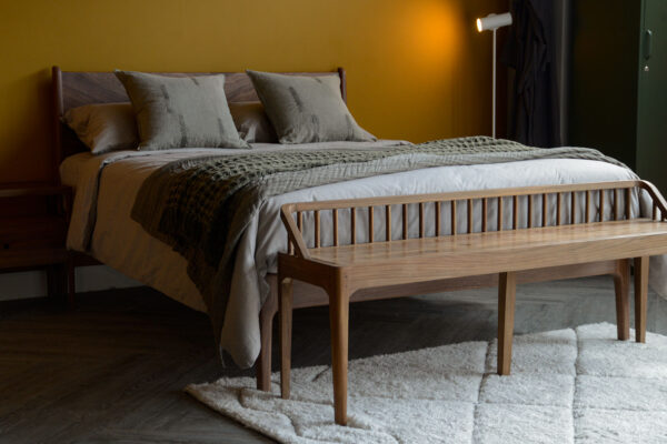reclaimed teak spindle bench in roomset