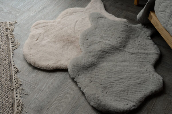 sand and grey small fur rugs