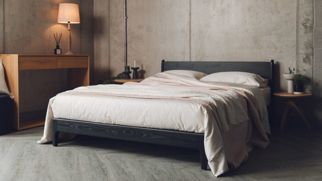 shell pink and blush bedding on black Pimlico low bed 23