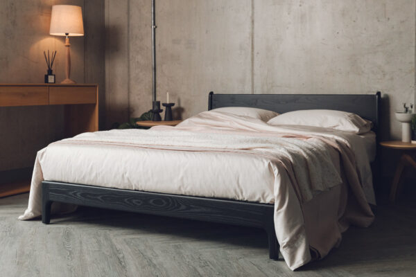shell pink and blush bedding on black Pimlico low bed 23