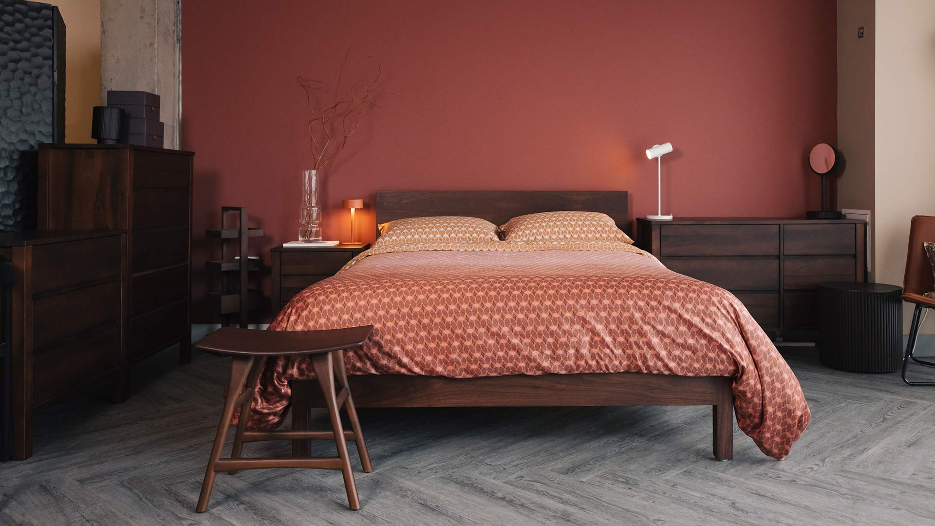 smoked walnut Malabar and storeg with teak osso stool and ombre bedding
