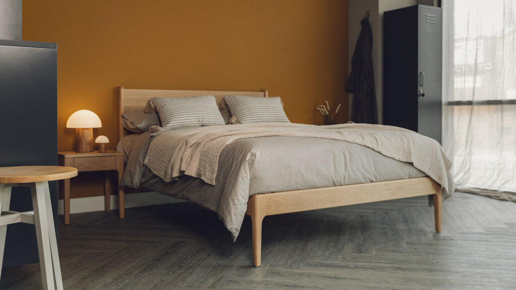 solid oak bed Camden bed organic bedding and plaster colour throw.