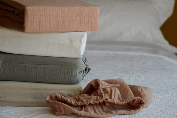 stack of double weave organic bedding