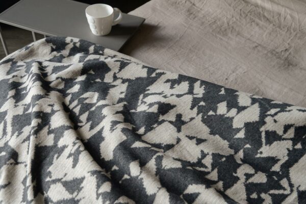 stone and charcoal patterned throw