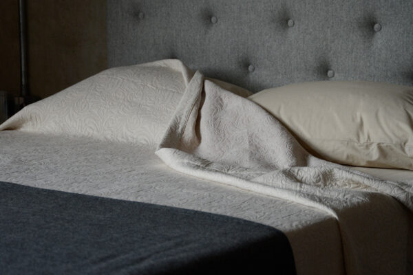 stone colour patterned bedspread