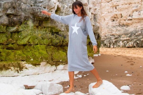 sweatshirt dress with star motif on model