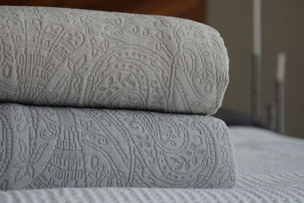 textured bedspreads with paisley style pattern