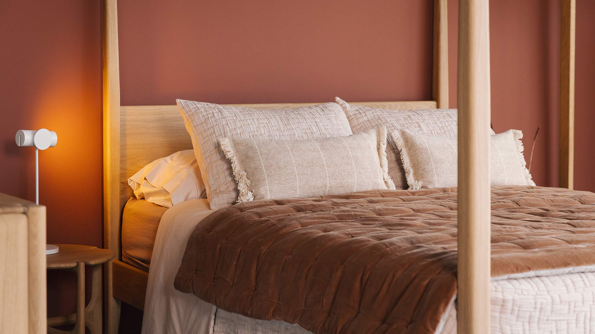 textured blush bedding with cinnamon quilt