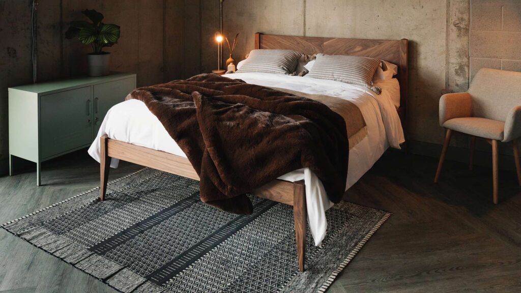 walnut Dalston bed with luxury faux fur bedspread from above