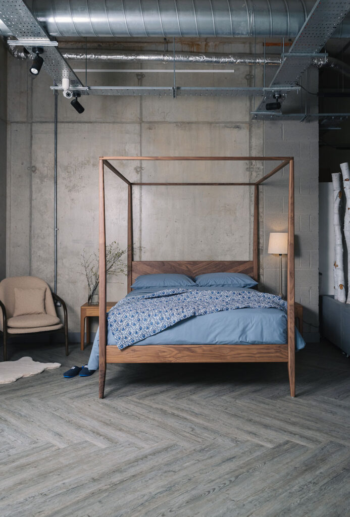 walnut Harrow bed with blue bedding portrait
