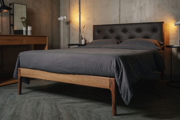 walnut mid century look bed with buttoned faux leather headboard